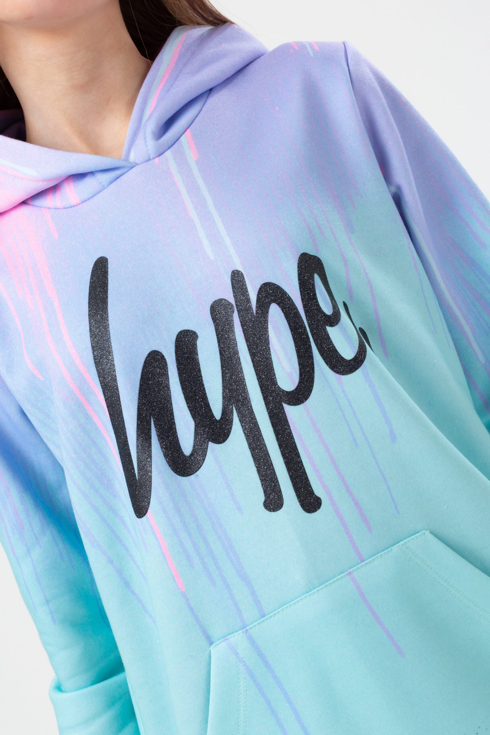 hype drip purple and turquoise hoodie close up