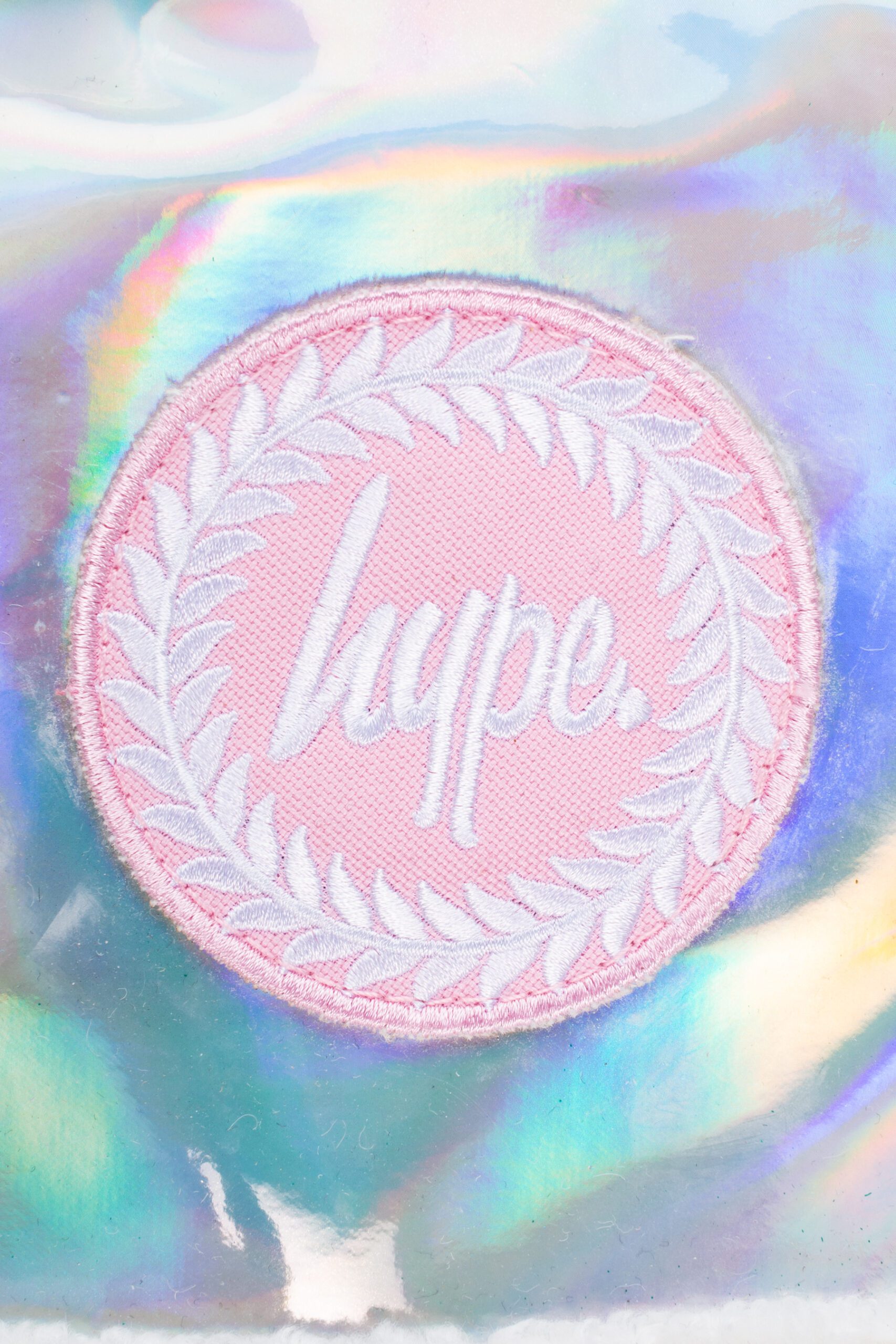 hype metallic unicorn backpack close up of logo