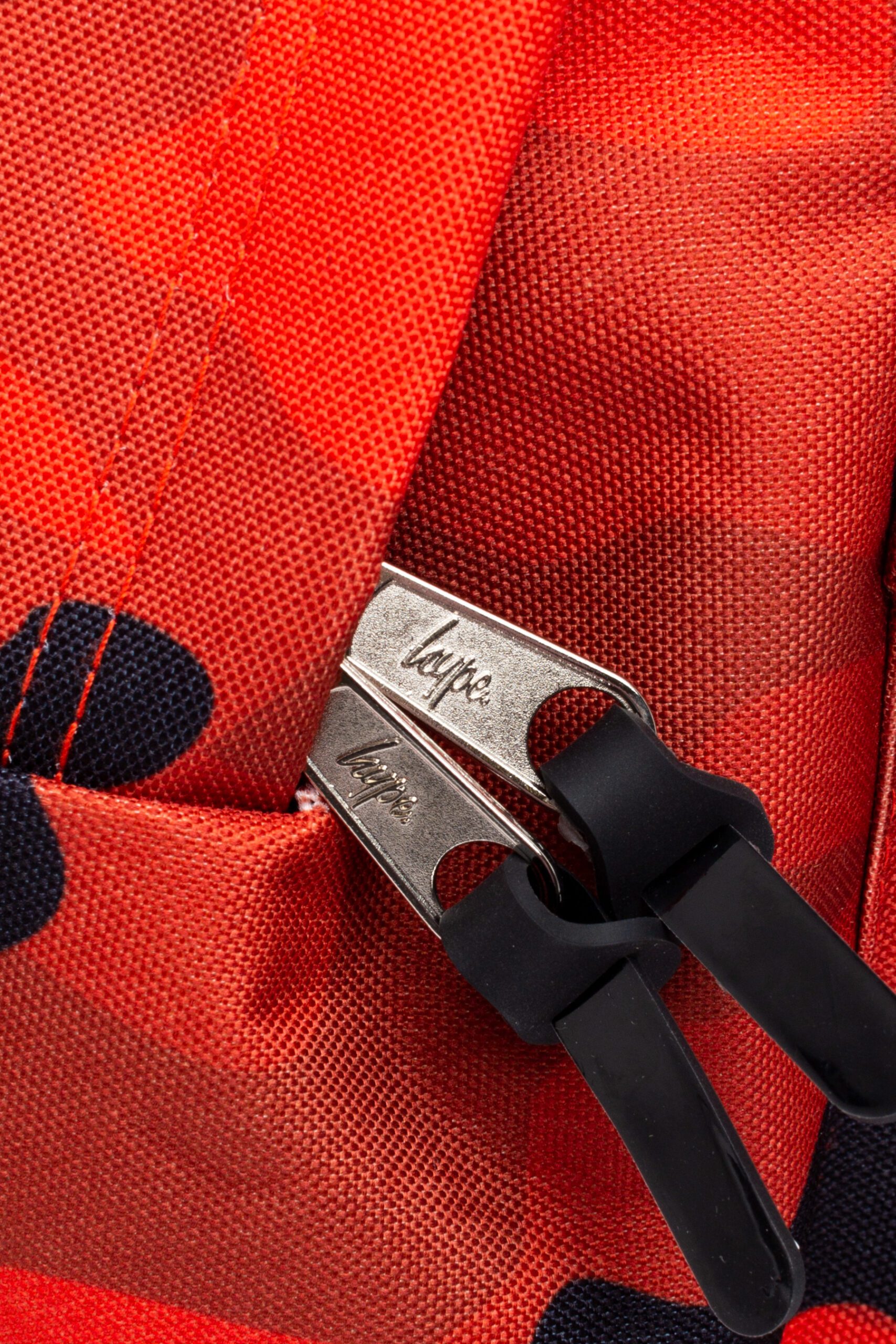 hype red camo backpack zips close up