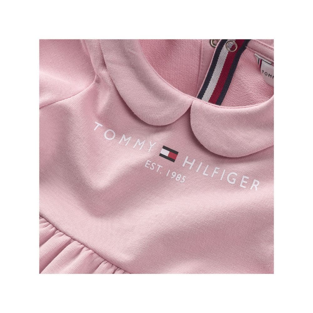 Tommy baby girl pale pink dress close up