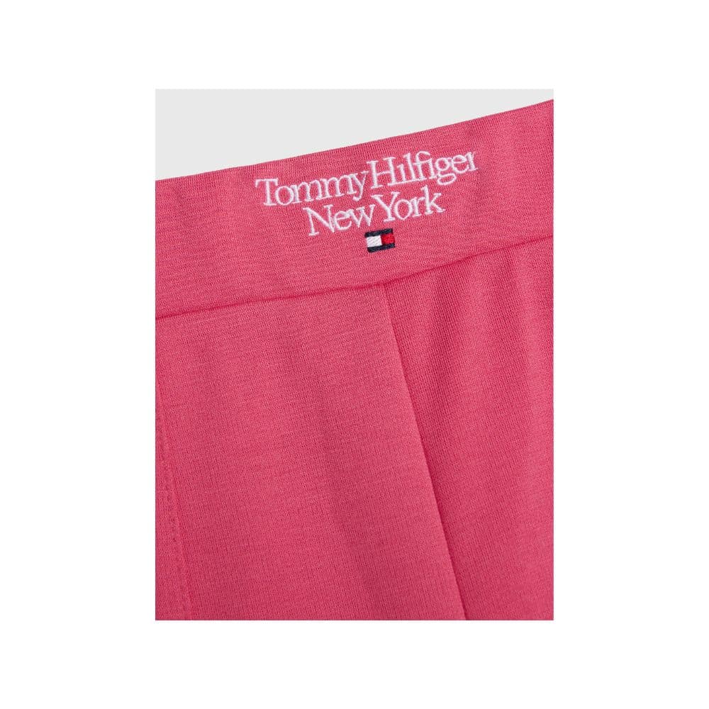 Tommy pink girls trousers with pink slits close up