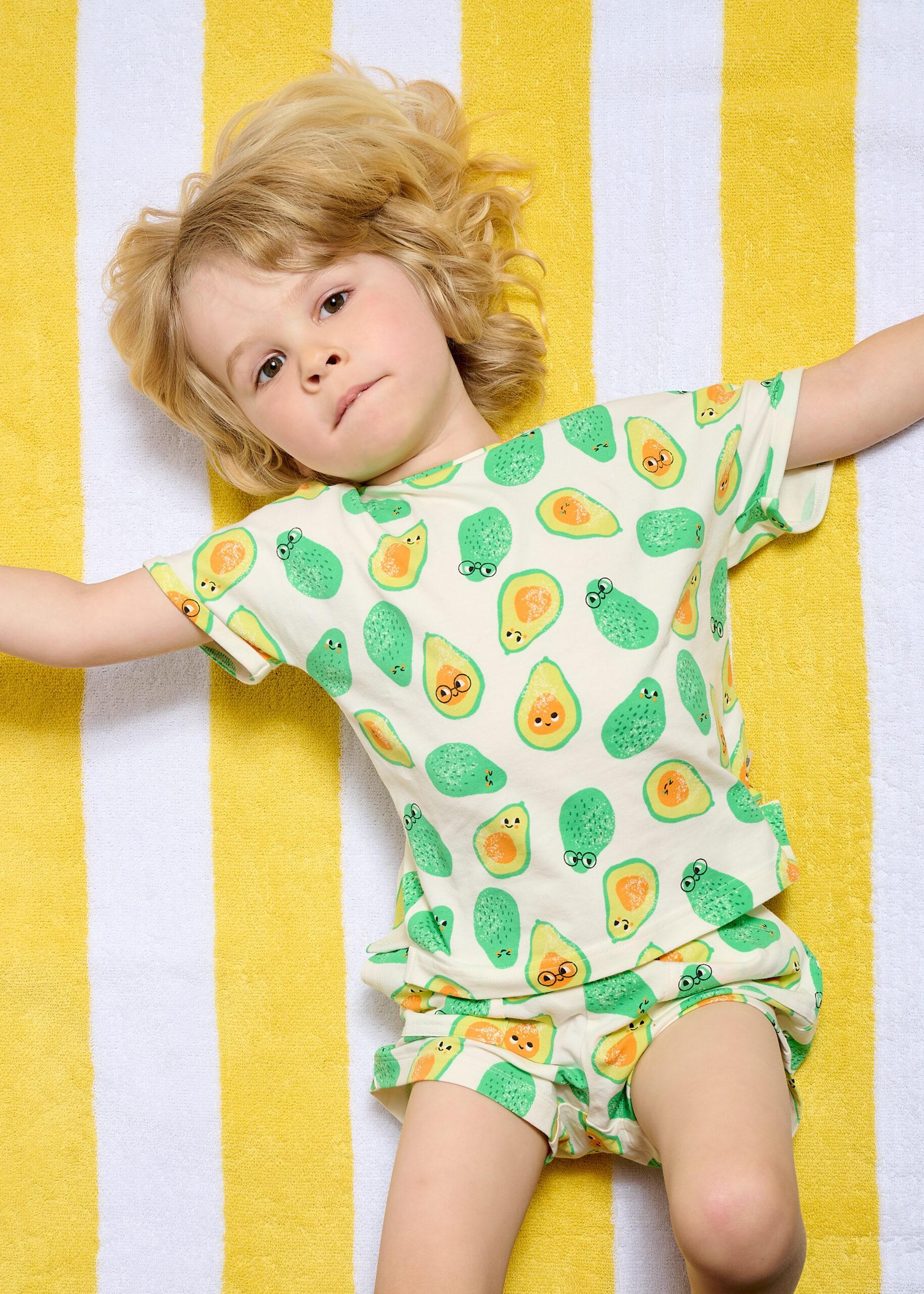 The Bonnie mob avocado baby set on lying down toddler model
