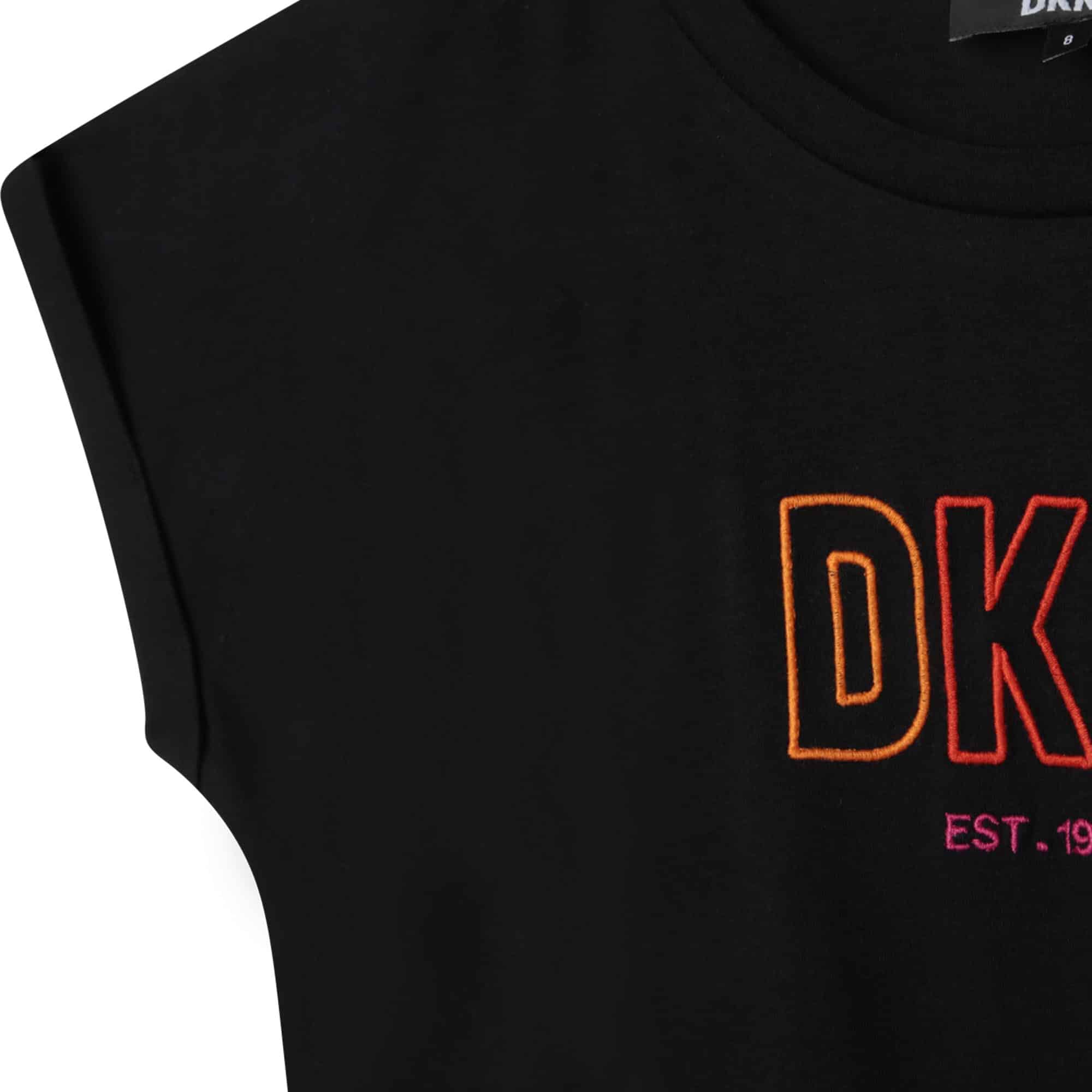 DKNY girls black tshirt with multi coloured logo close up