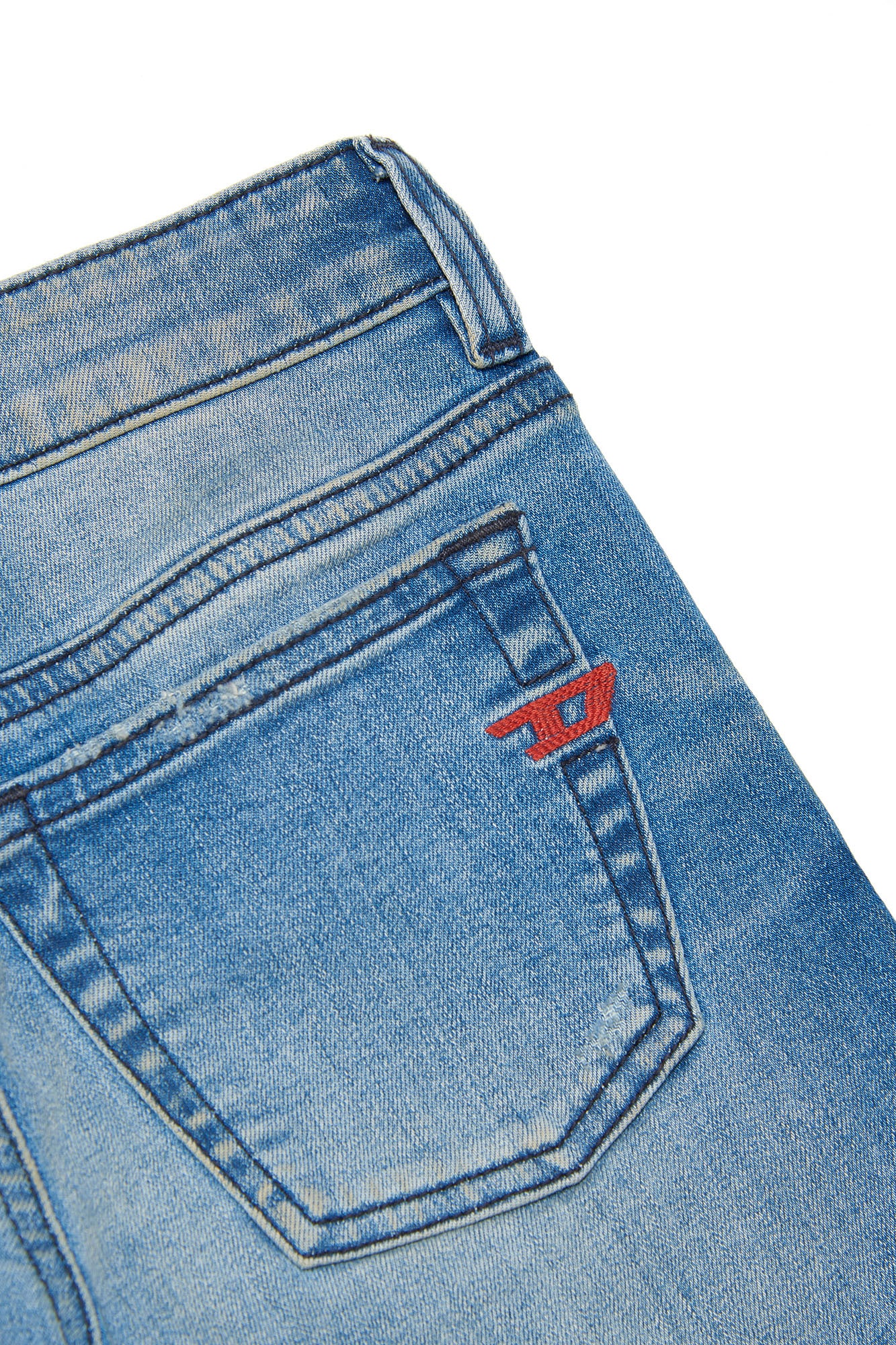 Diesel boys blue jeans with fade - close up
