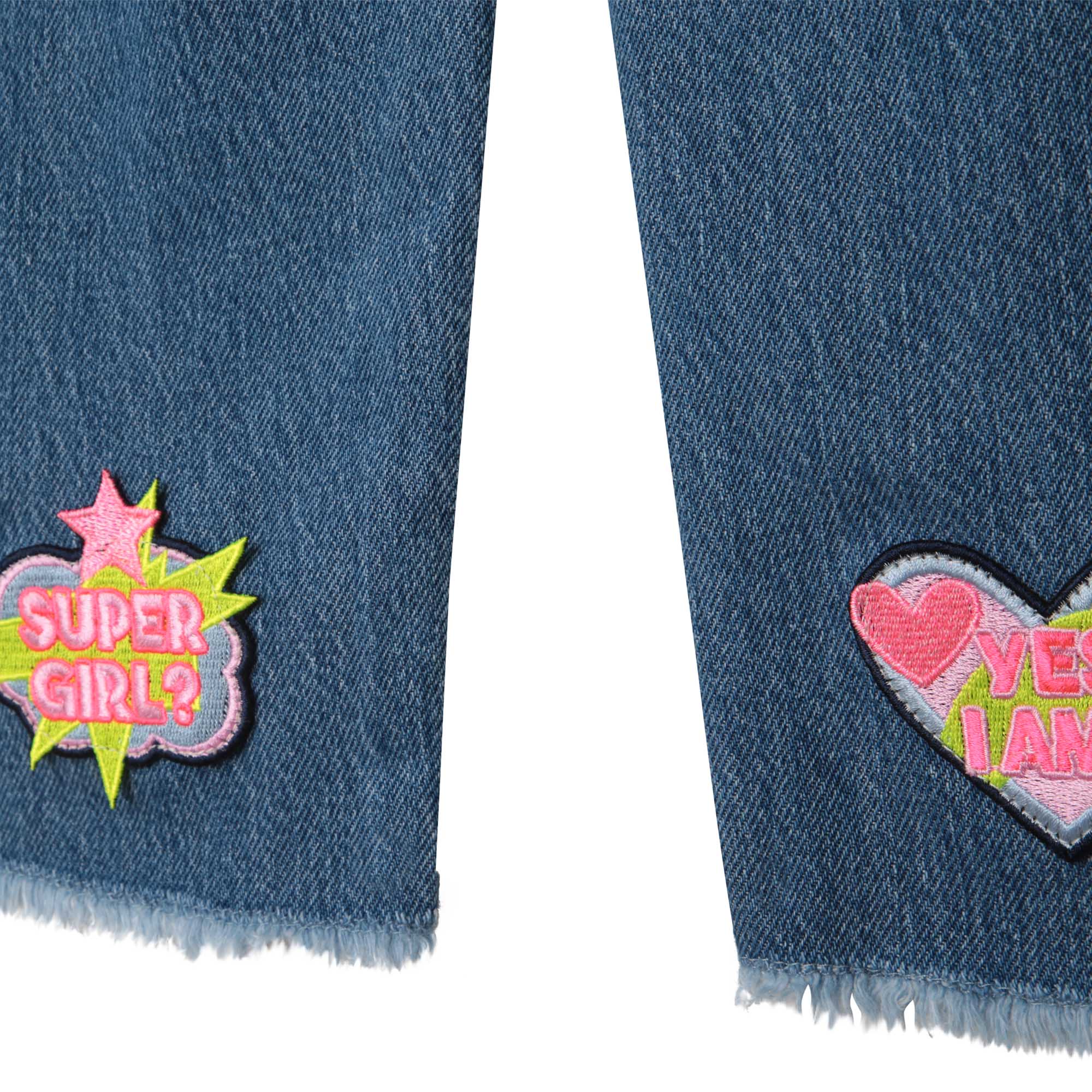 Billieblush girls jeans with heart logos - close up
