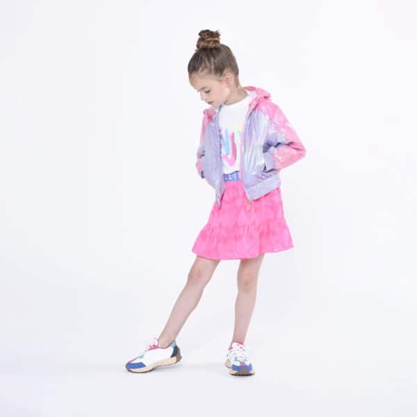 Billieblush girls irridescent multi coloured raincoat on model