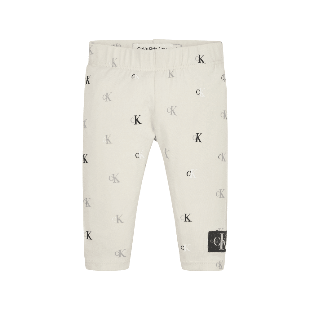 Calvin Klein boys cream trousers with logos