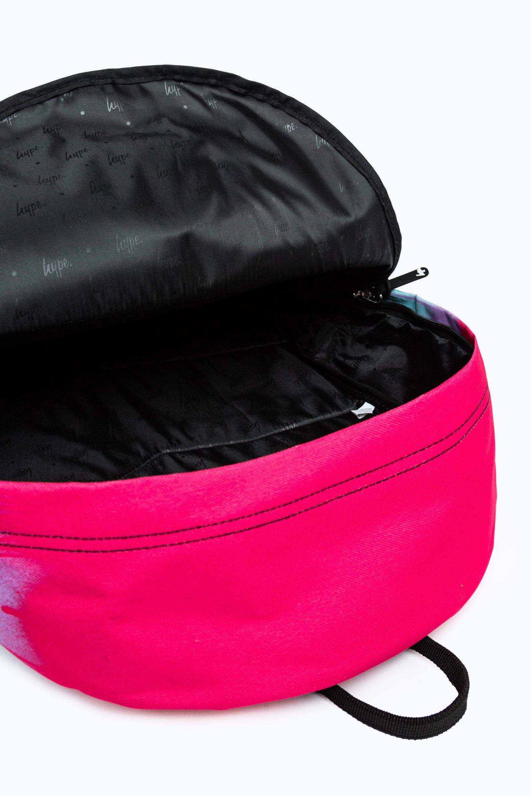 Hype pink and black paint drip backpack inside view