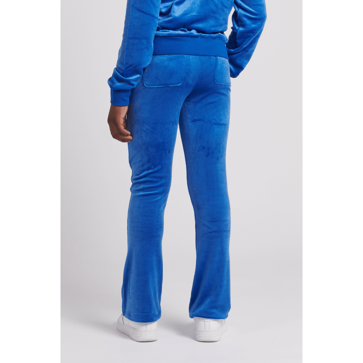 juicy couture girls blue velour trousers back view on model