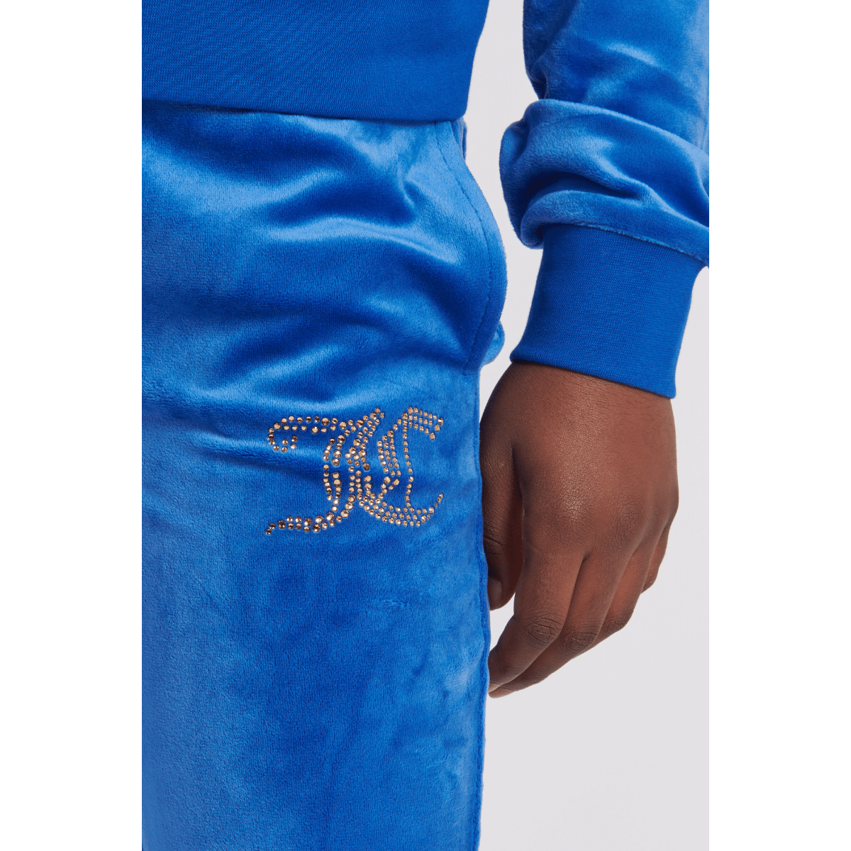 juicy couture girls blue velour trousers close up of logo