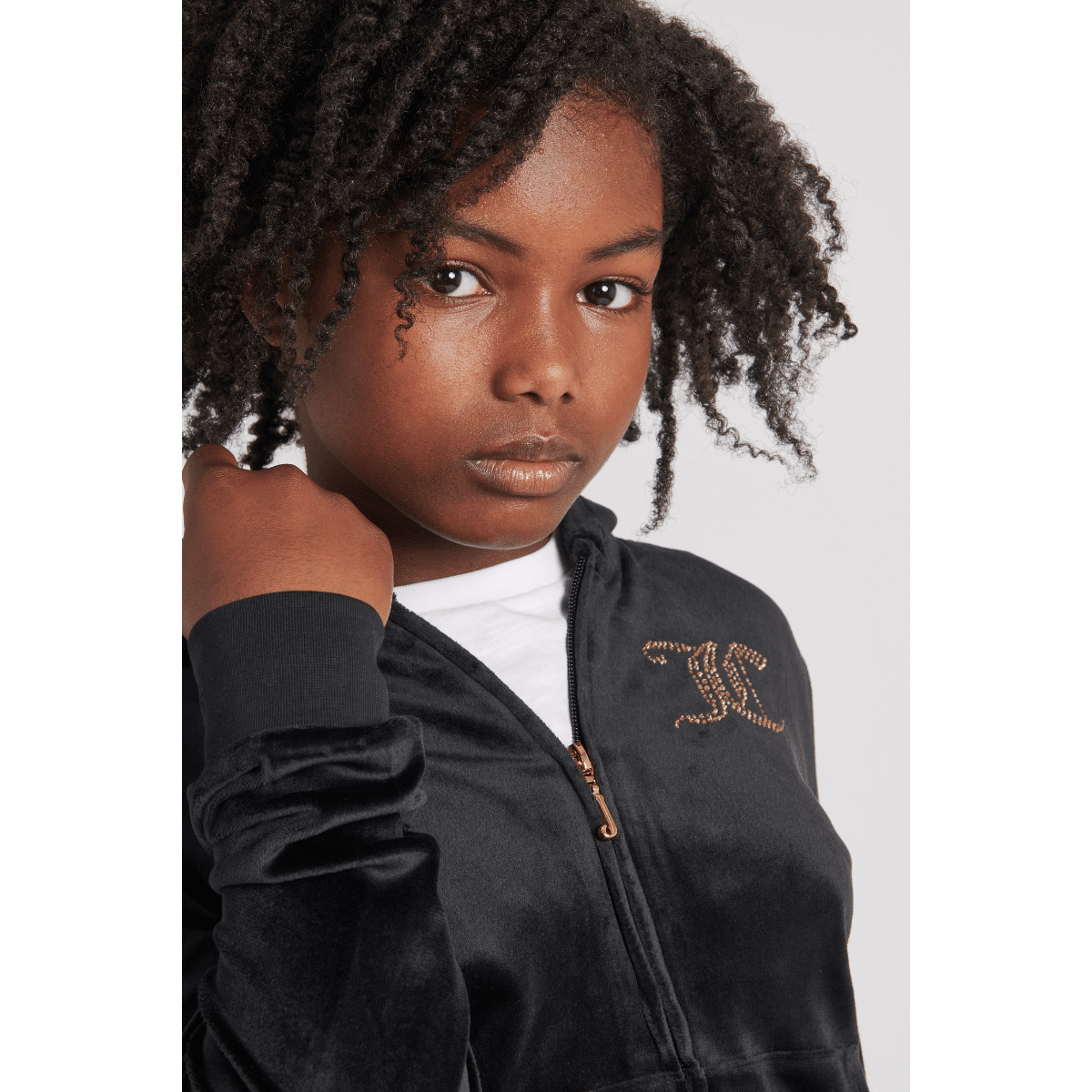 juicy couture girls black velour hoodie close up on model