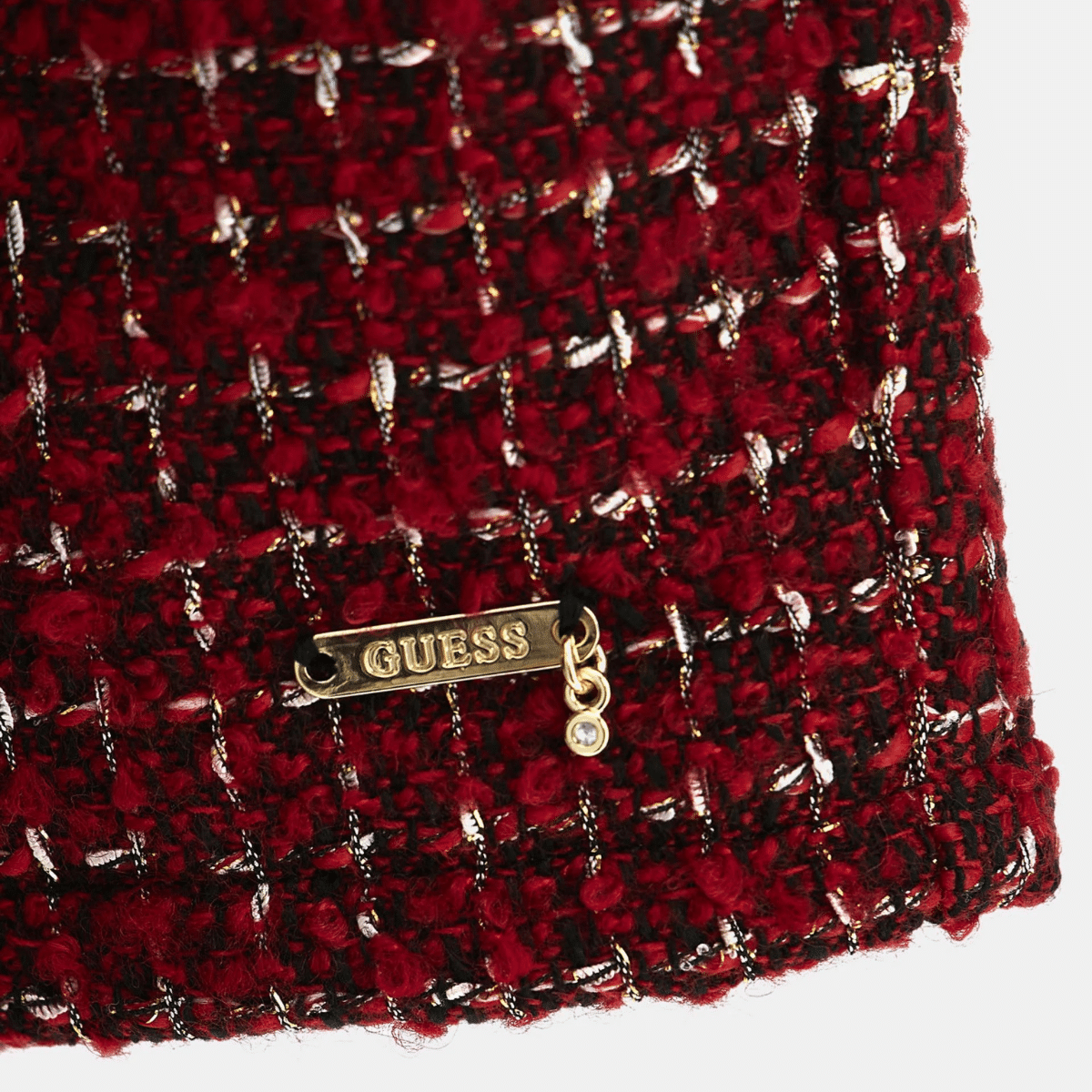 Guess girls red winter shorts close up of logo