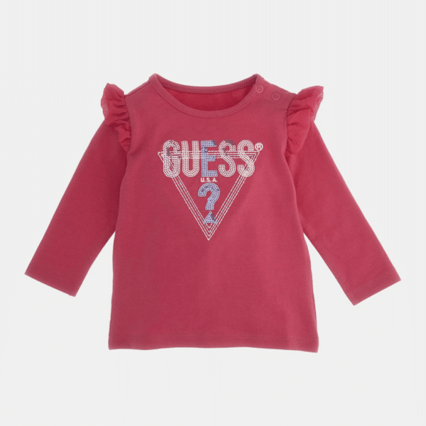Guess girls long sleeved pink tshirt with frills on grey background