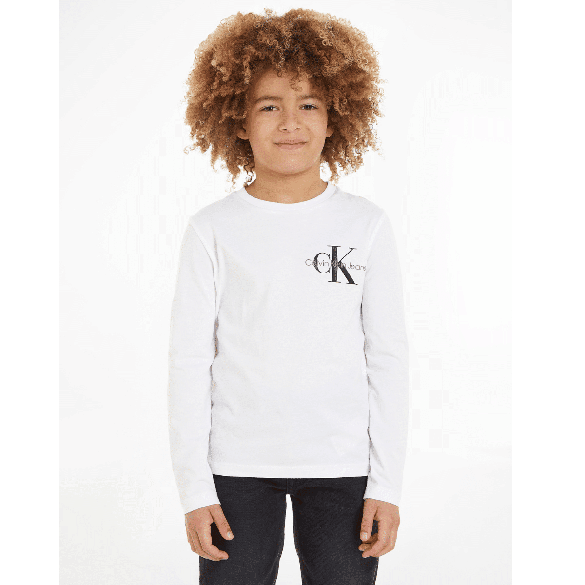 calvin klein childrens white long sleeved top with black logo on model