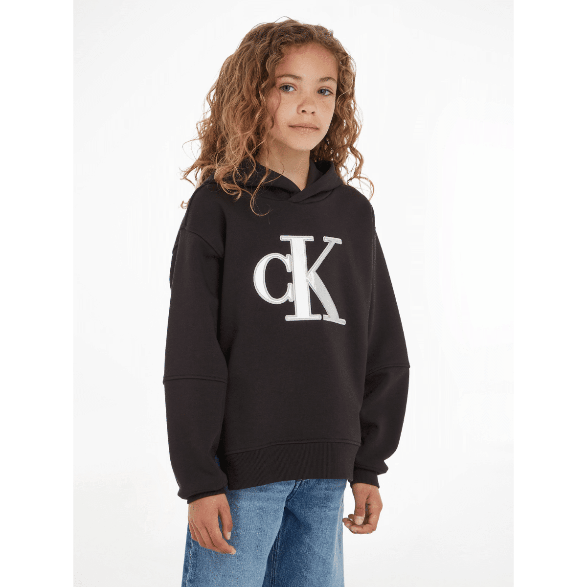 calvin klein girls black hoodie with large silver metallic logo on model