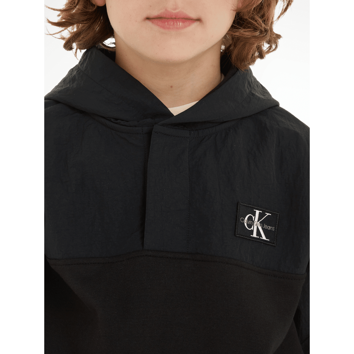 calvin klein unisex childrens black hoodie with white logo close up