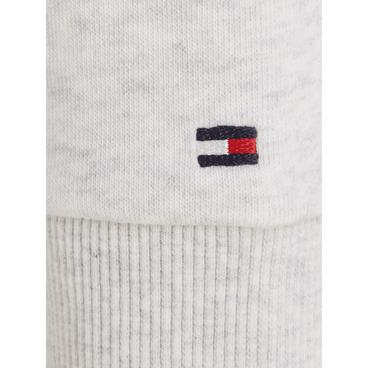 Hilfiger script hoodie close up of Tommy emblem